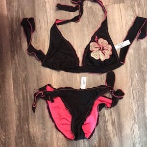 Black and pink flowered, ruffled bathing suit